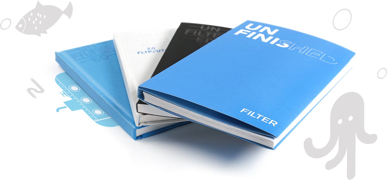 All four editions of the Filter Holiday Journal